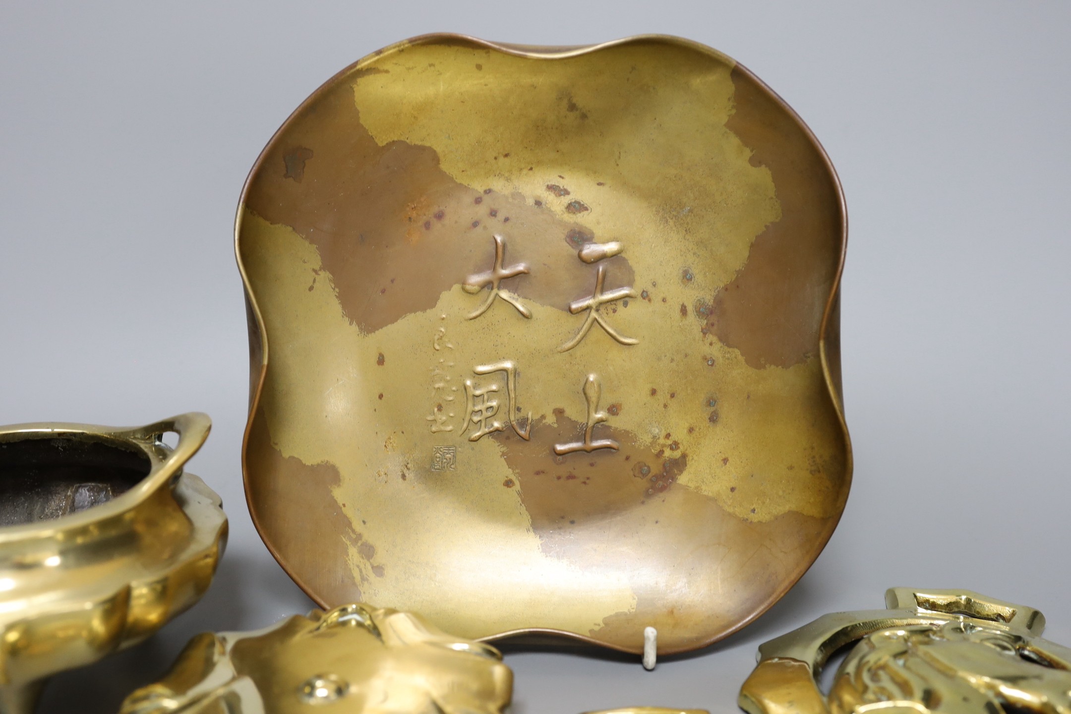 A selection of Chinese metalwares, to include a bronze censer and stand, 10cm tall, and a copper dish, together with four horse brasses (6)